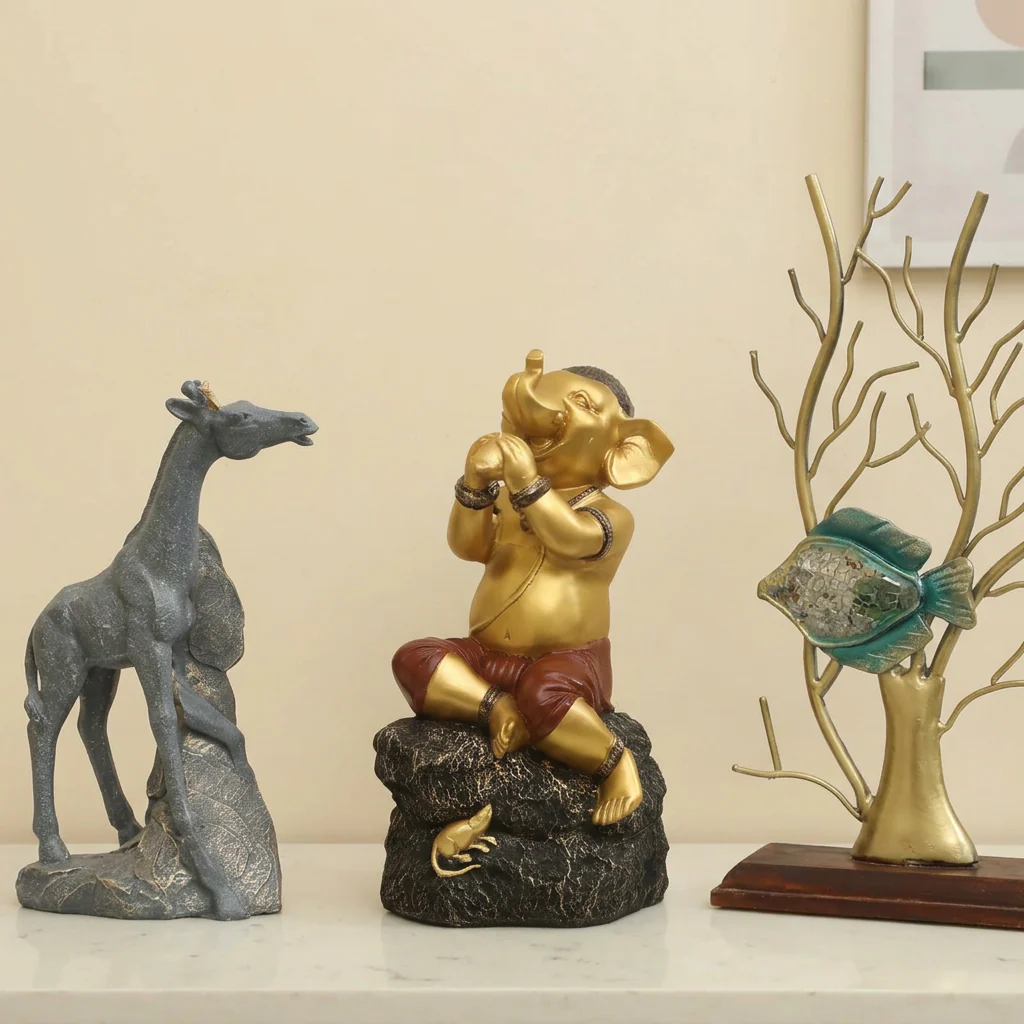 Playful Vinayaka Polyresin Showpiece - Gold & Black