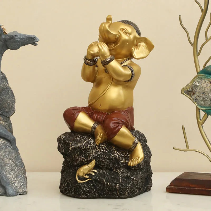 Playful Vinayaka Polyresin Showpiece - Gold & Black
