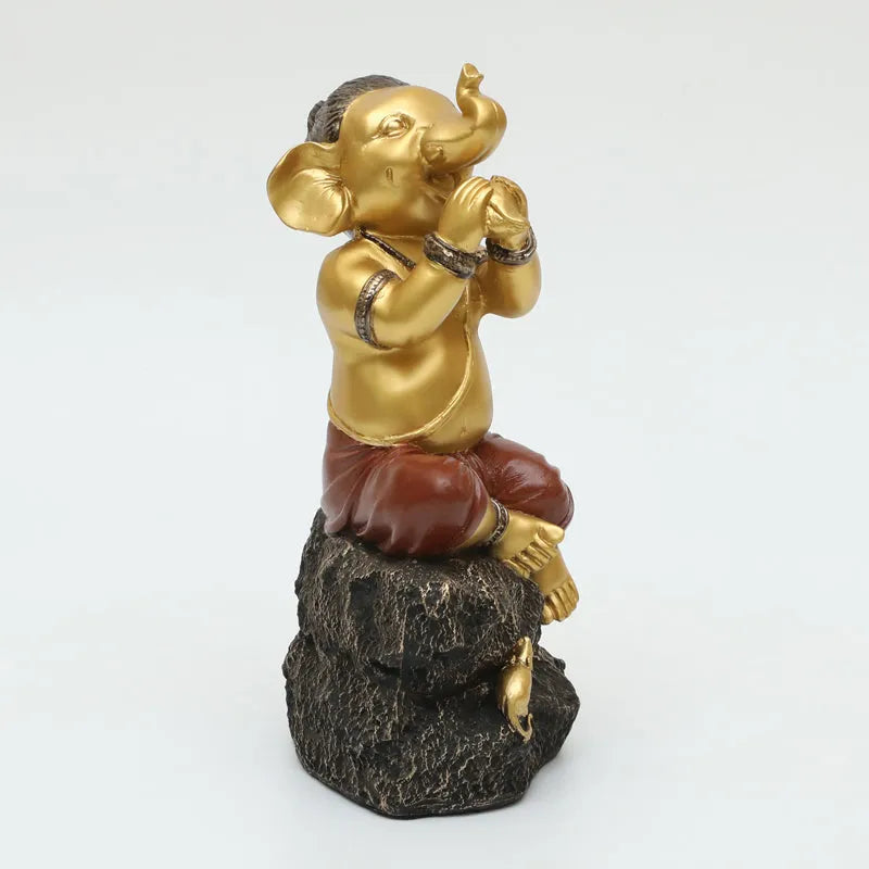 Playful Vinayaka Polyresin Showpiece - Gold & Black